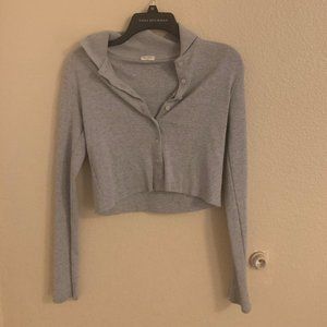 Grey colored button up sweater